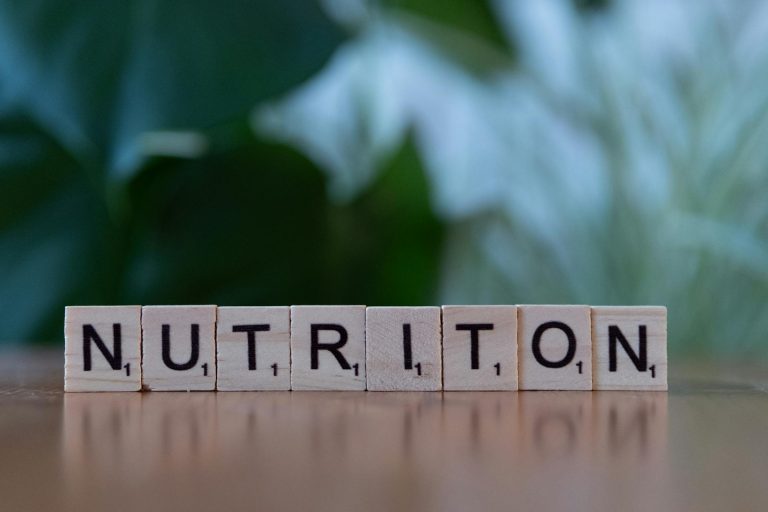 nutrition concept with wooden tiles